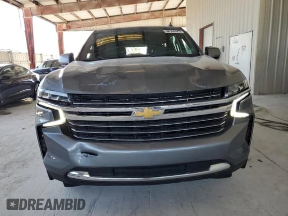 ✅ 2021 Chevrolet Suburban LT • VIN: 1GNSCCKD5MR295333 • Лот: 52556425. Опубликован ранее на Copart с пробегом 100 262 миль. Бесплатный доступ к архиву аукционных продаж из США и подробный отчёт об истории автомобиля на DreamBid. Изображение 5.