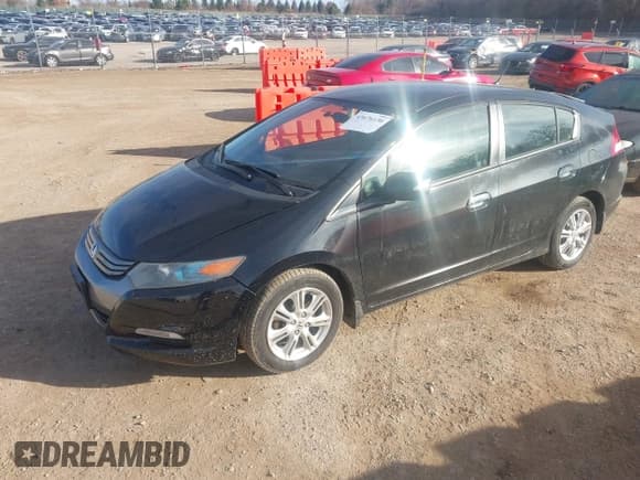 ✅ 2011 Honda Insight EX • VIN: JHMZE2H74BS011384 • Lot: 43676130. Wystawiony na IAAI z przebiegiem 177 219 mil. Bezpłatny archiwum sprzedaży aukcyjnych z USA i szczegółowy raport historii pojazdu na DreamBid. Zdjęcie 2.