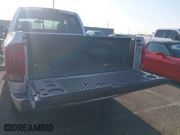 ✅ 2002 Dodge 1500 • VIN: 3D7HA18N22G200386 • Lot: 43111621. Listed on IAAI with 216,026 mi. Free auction sales archive from the USA and detailed vehicle history report at DreamBid. Image 12.