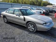 ✅ 1997 Pontiac Bonneville SE • VIN: 1G2HX52K7VH211607 • Lot: 73705454. Wystawiony na Copart z przebiegiem 116 307 mil. Bezpłatny archiwum sprzedaży aukcyjnych z USA i szczegółowy raport historii pojazdu na DreamBid. Zdjęcie 4.