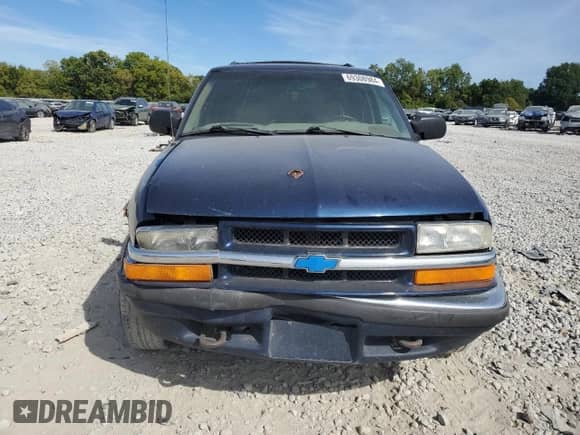 2001 Chevrolet Blazer LT с VIN 1GNDT13WX12194046, выставлен на аукционе Copart как лот 69308984 с пробегом 206 654 миль миль и Списание • Salvage title. История ставок и продаж доступна на DreamBid. Изображение 5.