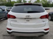 ✅ 2017 Hyundai Santa Fe 2.4L • VIN: 5XYZUDLB4HG418390 • Лот: 55275014. Опубликован ранее на Copart с пробегом 69 981 миль. Бесплатный доступ к архиву аукционных продаж из США и подробный отчёт об истории автомобиля на DreamBid. Изображение 6.