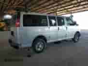 2010 Chevrolet Express Passenger LS with VIN 1GAZGPDG0A1167157, listed as a Copart auction lot 88460465 with 166,141 mi miles and Salvage title. Bid and sale history available at DreamBid. Image 3.