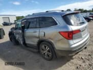 ✅ 2016 Honda Pilot EX-L • VIN: 5FNYF5H79GB007797 • Лот: 80924855. Опубликован ранее на Copart с пробегом 130 200 миль. Бесплатный доступ к архиву аукционных продаж из США и подробный отчёт об истории автомобиля на DreamBid. Изображение 2.