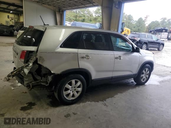 ✅ 2012 Kia Sorento LX • VIN: 5XYKT3A12CG229058 • Lot: 89854405. Listed on Copart with 194,490 mi. Free auction sales archive from the USA and detailed vehicle history report at DreamBid. Image 3.