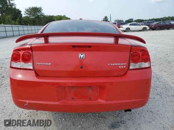 2010 Dodge Charger SXT with VIN 2B3CA3CVXAH228122, listed as a Copart auction lot 63802564 with 198,249 mi miles and Salvage title. Bid and sale history available at DreamBid. Image 6.