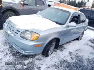 2004 Hyundai Accent GL z VIN KMHCG35C04U314674, wystawiony jako Copart lot #86047454 z przebiegiem 65 705 mil mil oraz Szkoda całkowita • Salvage title. Historia ofert i sprzedaży dostępna na DreamBid. Obrazek 1.