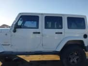 ✅ 2015 Jeep Wrangler Unlimited Sahara • VIN: 1C4BJWEG9FL519182 • Lot: 43672663. Listed on IAAI with 107,421 mi. Free auction sales archive from the USA and detailed vehicle history report at DreamBid. Image 14.