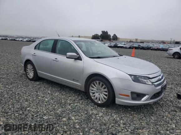 ✅ 2011 Ford Fusion Hybrid • VIN: 3FADP0L3XBR298309 • Лот: 91217515. Опубликован ранее на Copart с пробегом 158 915 миль. Бесплатный доступ к архиву аукционных продаж из США и подробный отчёт об истории автомобиля на DreamBid. Изображение 4.