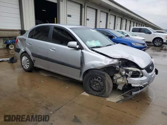 ✅ 2006 Kia Rio • VIN: KNADE123466101514 • Lot: 57590235. Listed on Copart with 208,185 mi. Free auction sales archive from the USA and detailed vehicle history report at DreamBid. Image 4.