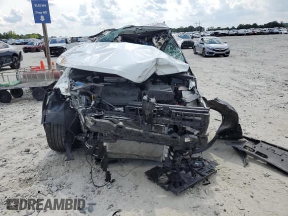 ✅ 2024 Volkswagen Tiguan SE R-Line Black • VIN: 3VVCB7AX7RM206875 • Lot: 69175185. Listed on Copart with 13,009 mi. Free auction sales archive from the USA and detailed vehicle history report at DreamBid. Image 5.
