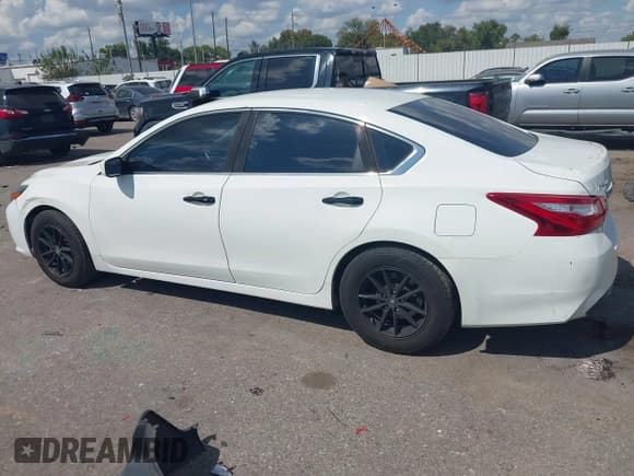 ✅ 2016 Nissan Altima SR • VIN: 1N4AL3AP4GC235119 • Lot: 43379591. Listed on IAAI with 165,546 mi. Free auction sales archive from the USA and detailed vehicle history report at DreamBid. Image 14.