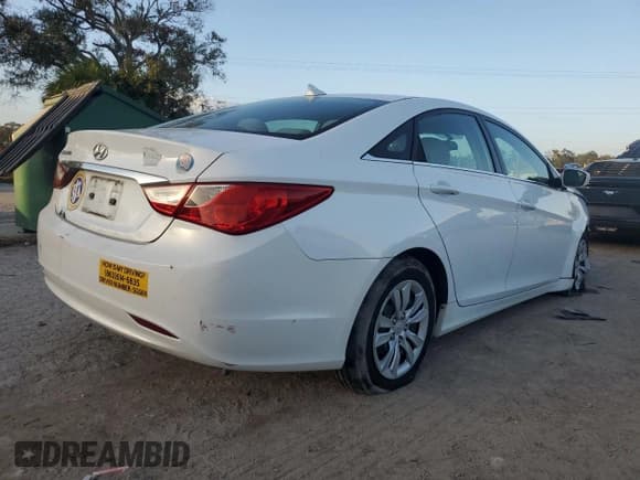 ✅ 2013 Hyundai Sonata GLS • VIN: 5NPEB4AC9DH562570 • Lot: 77090234. Listed on Copart with 106,859 mi. Free auction sales archive from the USA and detailed vehicle history report at DreamBid. Image 3.