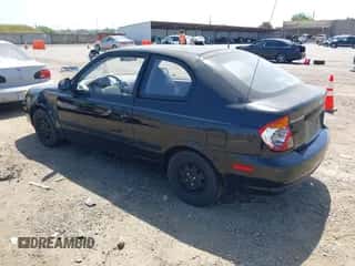 2003 Hyundai Accent with VIN KMHCF35CX3U271513, listed as a IAAI auction lot 42083235 with 166,240 mi miles and . Bid and sale history available at DreamBid. Image 3.