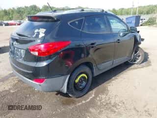 2014 Hyundai Tucson Limited with VIN KM8JU3AG3EU933487, listed as a IAAI auction lot 43279435 with 184,487 mi miles and . Bid and sale history available at DreamBid. Image 4.