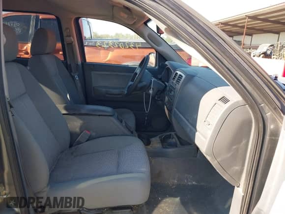 2007 Dodge Dakota SLT with VIN 1D7HW48K17S141534, listed as a IAAI auction lot 43202323 with 187,741 mi miles and . Bid and sale history available at DreamBid. Image 5.