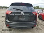 ✅ 2014 Mazda CX-5 Touring • VIN: JM3KE2CY9E0320147 • Lot: 82389585. Wystawiony na Copart z przebiegiem 143 896 mil. Bezpłatny archiwum sprzedaży aukcyjnych z USA i szczegółowy raport historii pojazdu na DreamBid. Zdjęcie 6.