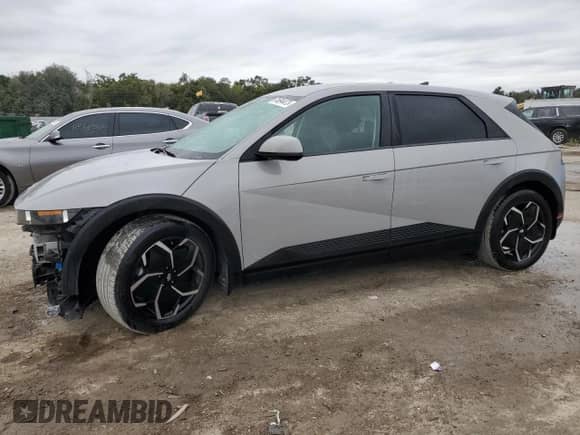 2022 Hyundai Ioniq 5 SE z VIN KM8KM4AE6NU073142, wystawiony jako Copart lot #74694473 z przebiegiem 28 623 mil mil oraz . Historia ofert i sprzedaży dostępna na DreamBid. Obrazek 1.