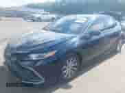 2021 Toyota Camry LE z VIN 4T1C11BK7MU020531, wystawiony jako IAAI lot #42761835 z przebiegiem 56 145 mil mil oraz . Historia ofert i sprzedaży dostępna na DreamBid. Obrazek 19.