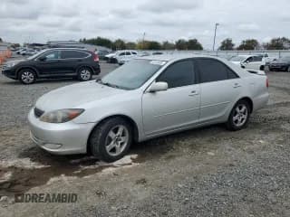 ✅ 2002 Toyota Camry XLE • VIN: 4T1BE32K22U001149 • Lot: 92916965. Listed on Copart with 233,885 mi. Free auction sales archive from the USA and detailed vehicle history report at DreamBid. Image 1.