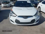 ✅ 2014 Hyundai Veloster • VIN: KMHTC6AD7EU218151 • Lot: 43619742. Wystawiony na IAAI z przebiegiem 193 516 mil. Bezpłatny archiwum sprzedaży aukcyjnych z USA i szczegółowy raport historii pojazdu na DreamBid. Zdjęcie 6.