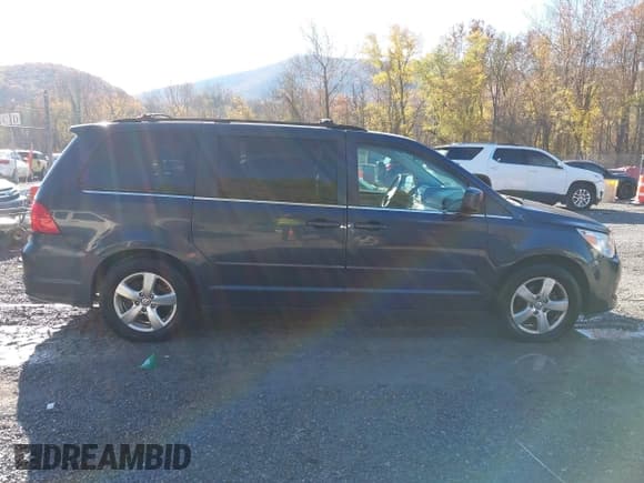 ✅ 2009 Volkswagen Routan SE • VIN: 2V8HW341X9R598675 • Lot: 43588204. Wystawiony na IAAI z przebiegiem 196 542 mil. Bezpłatny archiwum sprzedaży aukcyjnych z USA i szczegółowy raport historii pojazdu na DreamBid. Zdjęcie 13.