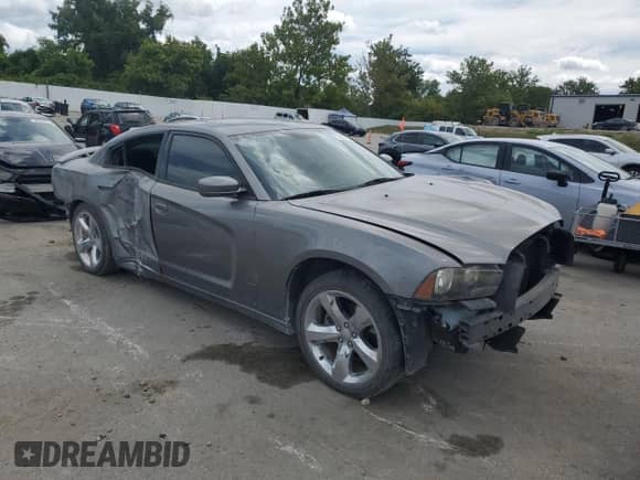 2012 Dodge Charger SXT с VIN 2C3CDXHG6CH126234, выставлен на аукционе Copart как лот 70297715 с пробегом 142 644 миль миль и Списание • Salvage title. История ставок и продаж доступна на DreamBid. Изображение 4.