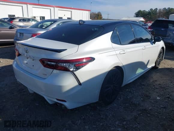 2021 Toyota Camry XSE with VIN 4T1K61AKXMU412532, listed as a IAAI auction lot 40975302 with 39,104 mi miles and . Bid and sale history available at DreamBid. Image 4.