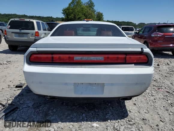 2013 Dodge Challenger SXT z VIN 2C3CDYAG8DH515751, wystawiony jako Copart lot #63542554 z przebiegiem 171 894 mil mil oraz Szkoda całkowita • Salvage title. Historia ofert i sprzedaży dostępna na DreamBid. Obrazek 6.