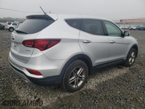 ✅ 2018 Hyundai Santa Fe 2.4L • VIN: 5XYZT3LB2JG571997 • Лот: 71226213. Опубликован ранее на Copart с пробегом Не указан. Бесплатный доступ к архиву аукционных продаж из США и подробный отчёт об истории автомобиля на DreamBid. Изображение 3.