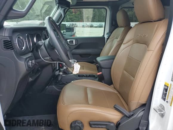 ✅ 2022 Jeep Wrangler Unlimited Sahara Altitude • VIN: 1C4HJXEG3NW148744 • Lot: 70289415. Listed on Copart with 21,630 mi. Free auction sales archive from the USA and detailed vehicle history report at DreamBid. Image 7.
