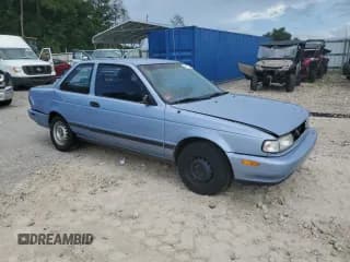 ✅ 1991 Nissan Sentra E • VIN: 1N4EB32A7MC714290 • Лот: 67108475. Опубликован ранее на Copart с пробегом 42 343 миль. Бесплатный доступ к архиву аукционных продаж из США и подробный отчёт об истории автомобиля на DreamBid. Изображение 4.