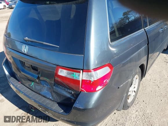✅ 2005 Honda Odyssey EX-L • VIN: 5FNRL38725B102748 • Lot: 43810716. Listed on IAAI with 211,348 mi. Free auction sales archive from the USA and detailed vehicle history report at DreamBid. Image 6.