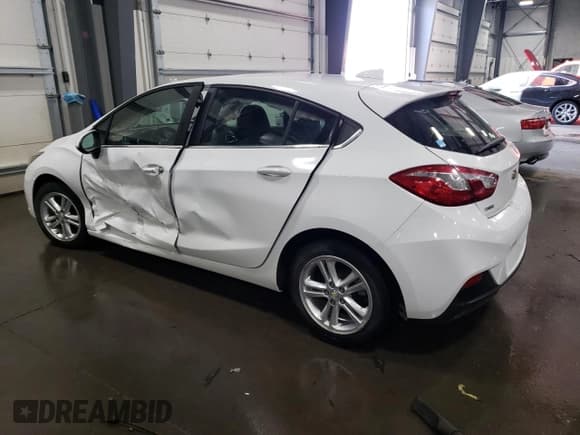 ✅ 2017 Chevrolet Cruze LT • VIN: 3G1BE6SM0HS587200 • Lot: 38518523. Listed on Copart with 86,061 mi. Free auction sales archive from the USA and detailed vehicle history report at DreamBid. Image 2.