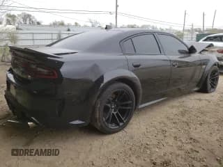 ✅ 2023 Dodge Charger Scat Pack • VIN: 2C3CDXGJXPH539910 • Lot: 71697835. Listed on Copart with 15,569 mi. Free auction sales archive from the USA and detailed vehicle history report at DreamBid. Image 3.