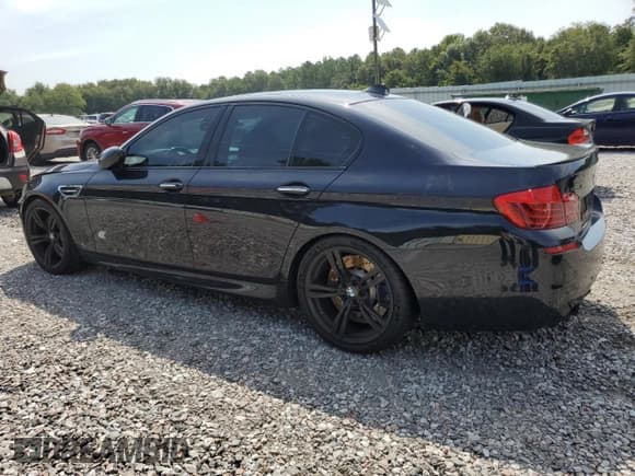 ✅ 2016 BMW M5 • VIN: WBSFV9C55GD595799 • Лот: 65708864. Опубликован ранее на Copart с пробегом 104 198 миль. Бесплатный доступ к архиву аукционных продаж из США и подробный отчёт об истории автомобиля на DreamBid. Изображение 2.