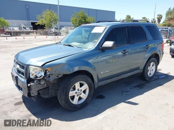 ✅ 2011 Ford Escape Hybrid • VIN: 1FMCU4K30BKC54584 • Лот: 42131257. Опубликован ранее на IAAI с пробегом 107 905 миль. Бесплатный доступ к архиву аукционных продаж из США и подробный отчёт об истории автомобиля на DreamBid. Изображение 2.