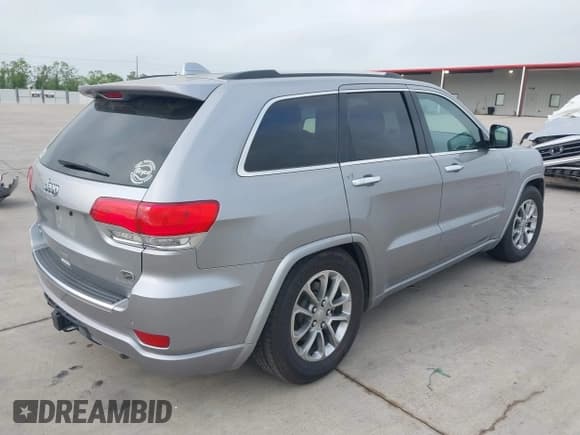 ✅ 2015 Jeep Grand Cherokee Overland • VIN: 1C4RJFCMXFC725683 • Lot: 41960837. Listed on IAAI with 117,200 mi. Free auction sales archive from the USA and detailed vehicle history report at DreamBid. Image 4.