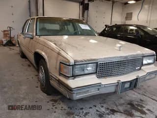 ✅ 1987 Cadillac DeVille • VIN: 1G6CD5185H4288138 • Lot: 43734080. Wystawiony na IAAI z przebiegiem 99 243 mil. Bezpłatny archiwum sprzedaży aukcyjnych z USA i szczegółowy raport historii pojazdu na DreamBid. Zdjęcie 1.