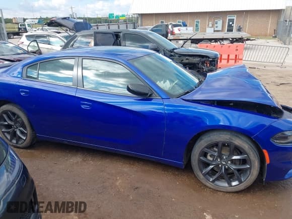 ✅ 2022 Dodge Charger SXT • VIN: 2C3CDXBG3NH114876 • Lot: 43307601. Listed on IAAI with 42,882 mi. Free auction sales archive from the USA and detailed vehicle history report at DreamBid. Image 14.