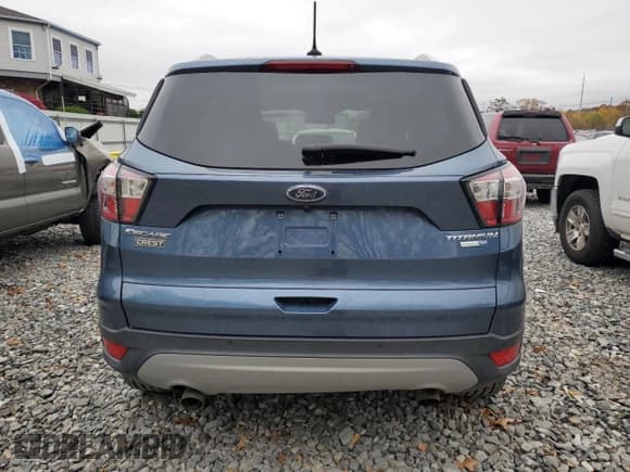 ✅ 2018 Ford Escape Titanium • VIN: 1FMCU9J92JUB01162 • Lot: 90094025. Wystawiony na Copart z przebiegiem Nie podano. Bezpłatny archiwum sprzedaży aukcyjnych z USA i szczegółowy raport historii pojazdu na DreamBid. Zdjęcie 6.