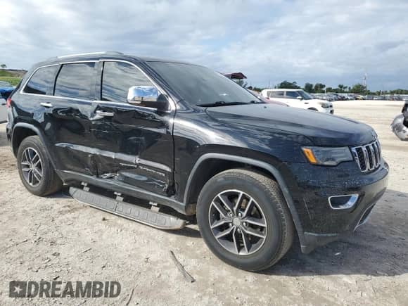 2017 Jeep Grand Cherokee Limited with VIN 1C4RJEBG6HC943600, listed as a Copart auction lot 90262365 with 159,096 mi miles and Salvage title. Bid and sale history available at DreamBid. Image 4.