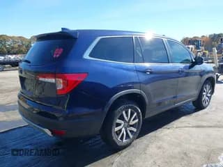 ✅ 2022 Honda Pilot EX-L • VIN: 5FNYF5H50NB006176 • Лот: 43587136. Опубликован ранее на IAAI с пробегом 61 036 миль. Бесплатный доступ к архиву аукционных продаж из США и подробный отчёт об истории автомобиля на DreamBid. Изображение 4.