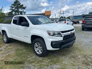 ✅ 2021 Chevrolet Colorado 2WD LT • VIN: 1GCHSCEA4M1255900 • Лот: 71047705. Опубликован ранее на Copart с пробегом 106 007 миль. Бесплатный доступ к архиву аукционных продаж из США и подробный отчёт об истории автомобиля на DreamBid. Изображение 1.