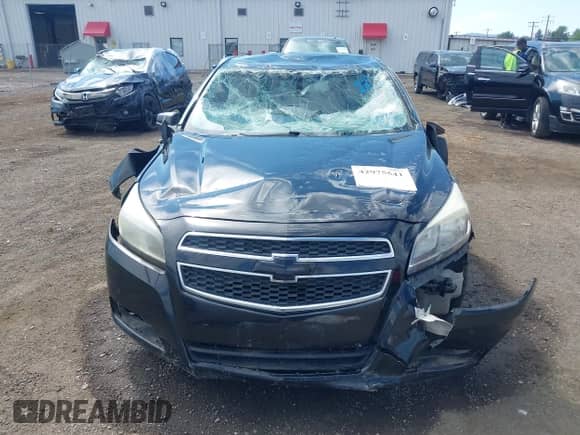 2013 Chevrolet Malibu LS z VIN 1G11A5SA7DU130756, wystawiony jako IAAI lot #42975541 z przebiegiem Nie podano mil oraz . Historia ofert i sprzedaży dostępna na DreamBid. Obrazek 13.