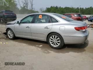 2006 Hyundai Azera SE с VIN KMHFC46FX6A087229, выставлен на аукционе Copart как лот 58816365 с пробегом 152 144 миль миль и На запчасти • Non repairable. История ставок и продаж доступна на DreamBid. Изображение 2.