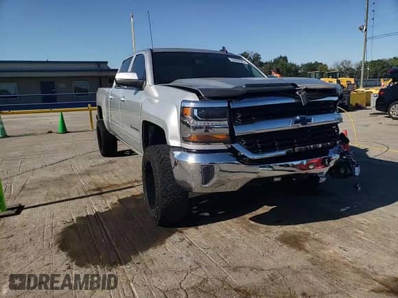 2017 Chevrolet Silverado 1500 LT с VIN 3GCUKREC0HG109911, выставлен на аукционе Copart как лот 69983525 с пробегом 152 813 миль миль и Списание • Salvage title. История ставок и продаж доступна на DreamBid. Изображение 13.