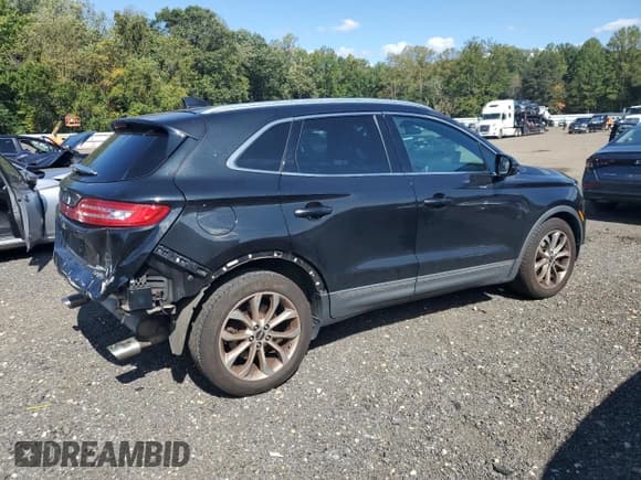 ✅ 2015 Lincoln MKC • VIN: 5LMCJ2A92FUJ08567 • Lot: 71800085. Listed on Copart with 136,715 mi. Free auction sales archive from the USA and detailed vehicle history report at DreamBid. Image 3.