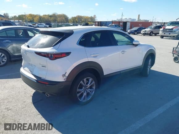 ✅ 2023 Mazda CX-30 S Select • VIN: 3MVDMBBM9PM509401 • Lot: 43659569. Wystawiony na IAAI z przebiegiem 12 852 mil. Bezpłatny archiwum sprzedaży aukcyjnych z USA i szczegółowy raport historii pojazdu na DreamBid. Zdjęcie 4.