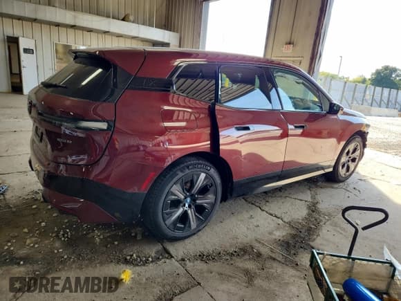 ✅ 2024 BMW iX xDrive50 • VIN: WB523CF03RCR29633 • Лот: 80166265. Опубликован ранее на Copart с пробегом 7 077 миль. Бесплатный доступ к архиву аукционных продаж из США и подробный отчёт об истории автомобиля на DreamBid. Изображение 3.